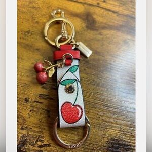 Coach cherry trigger snap keychain